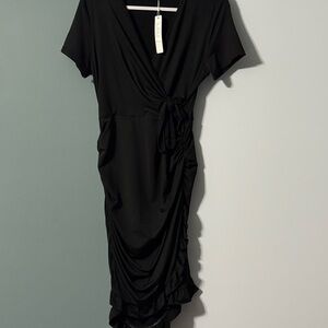 Classic Black Wrap-Style Women's Dress Ruching bottom side ruffle. Never worn